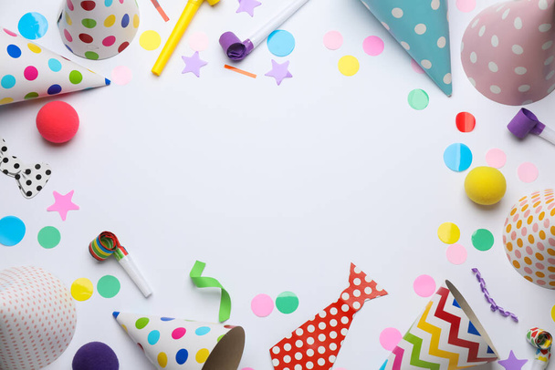 Frame of party items on white background, flat lay. Space for text - Foto, imagen
