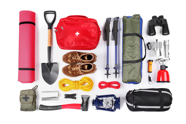 Set of camping equipment on white background, top view. Packing for trip - Foto, Bild