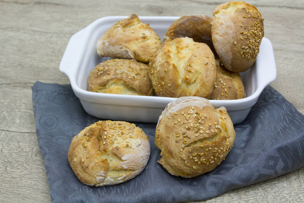 homemade buns with sesame seeds - Fotoğraf, Görsel