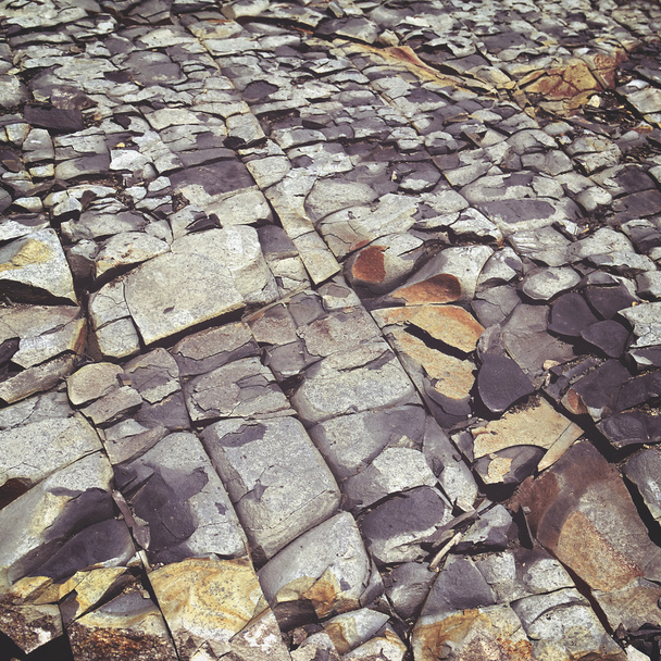 cracked stone rock in the style of grunge - Photo, Image