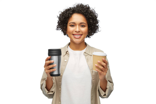 woman with coffee cup and tumbler for hot drinks - Foto, Imagem