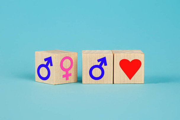 Male and female symbols. Pink and blue female and male signs. Gender equality conceptual image, the meaning of sex and equality of male and female on blu background, sexual orientation icon. - Foto, immagini