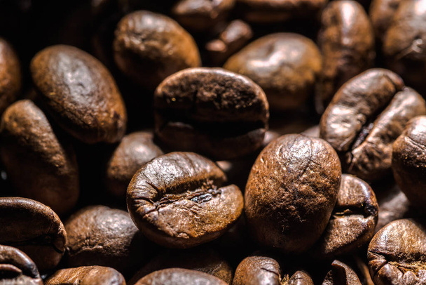 Freshly roasted coffee beans background. Coffee beans macro, texture. - Photo, image