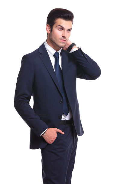 attractive business man looking away from the camera  - Foto, imagen