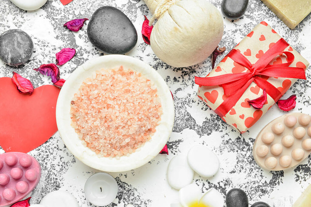 Beautiful spa composition with stones for Valentine's Day celebration on grey background - Foto, Imagem