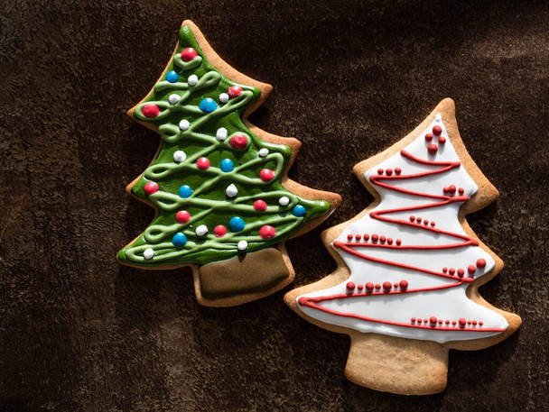 A beautiful selection of traditionally decorated, homemade gingerbread cookies for Christmas - 写真・画像