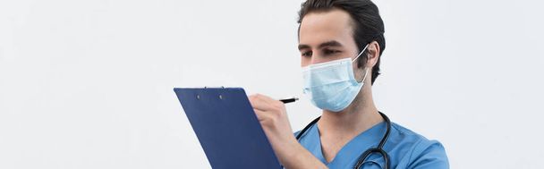 orvos orvosi maszk írásban diagnózis vágólapon elszigetelt szürke, banner - Fotó, kép