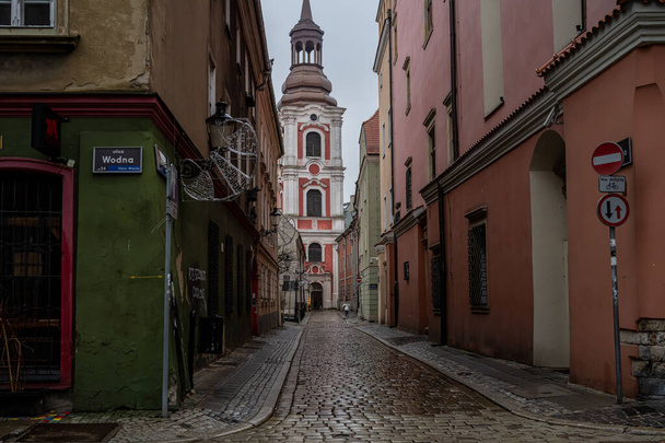 An old town alley close to the renaissance market square in Poznan, Poland - Photo, Image