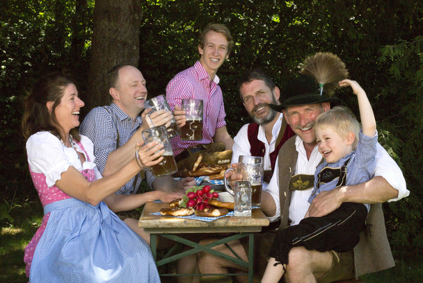 Bavarian family in the park - Фото, зображення