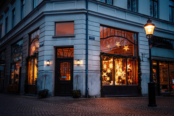 Store front with decorations early morning - Zdjęcie, obraz