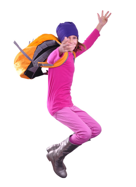 happy schoolgirl or traveler exercising and jumping - Valokuva, kuva