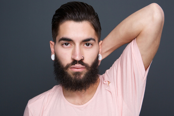 Handsome man with beard and piercings  - Photo, Image