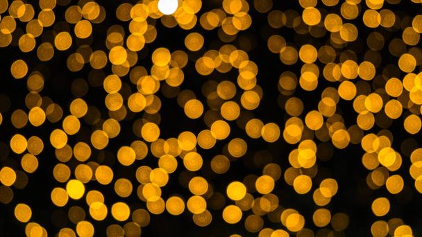 Fond bokeh abstrait de Noël coloré. Illumination lumière toile de fond. Festive veilleuses de rue. Sparkle bokeh toile de fond - Photo, image