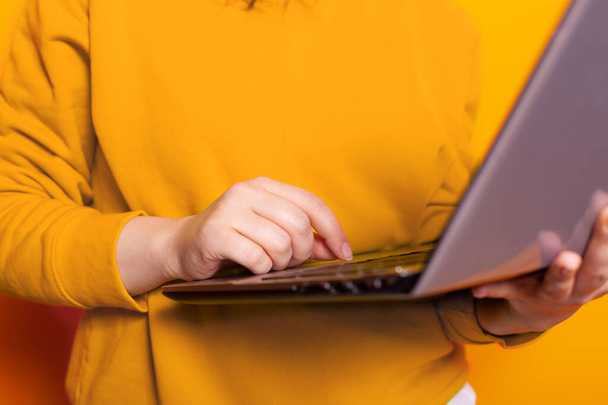 Close up of hand of person using modern laptop - Photo, Image