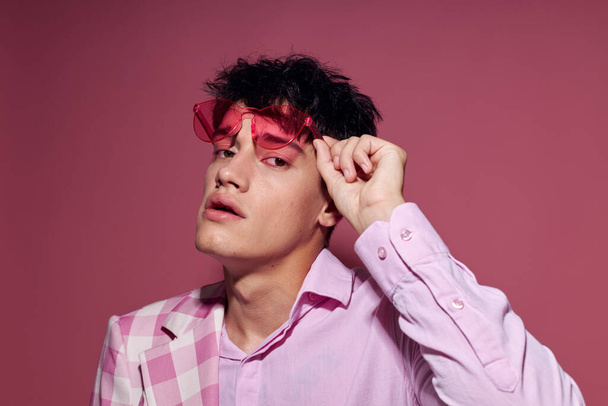 portrait of a young man pink shirt and glasses jacket fashion elegant style isolated background unaltered - Φωτογραφία, εικόνα