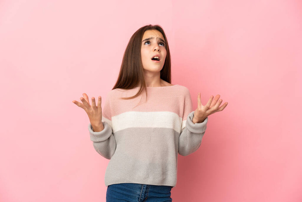 Little girl isolated on pink background stressed overwhelmed - Foto, Bild