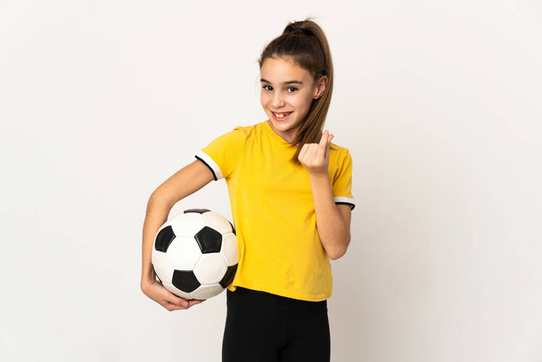 Piccolo calciatore ragazza isolato su sfondo bianco fare soldi gesto - Foto, immagini