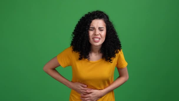 Lady suffer bellyache digestion problem isolated vibrant color background - Záběry, video