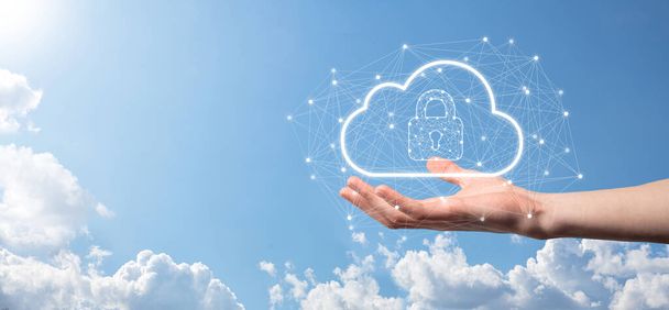 Business man hold,holding cloud computing data and security on global networking,Padlock and cloud icon. Technology of business.Cybersecurity and information or network protection.internet project. - Photo, Image