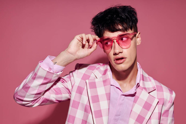 Photo of romantic young boyfriend self confidence pink plaid blazer fashion posing pink background unaltered - Foto, imagen