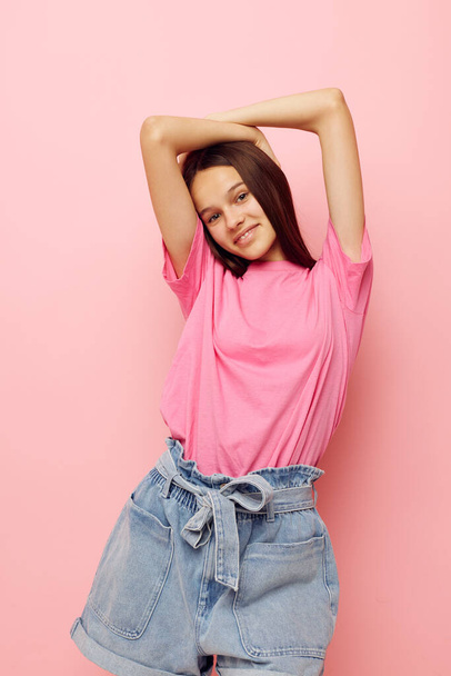 photography pretty woman in a pink t-shirt casual clothes Lifestyle unaltered - Фото, зображення