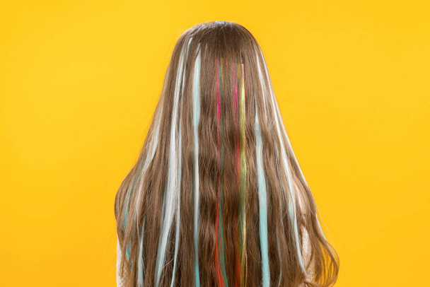 Teenage hairstyle. Rebellious style. Hair with multi-colored strands. Highlighting. - Zdjęcie, obraz