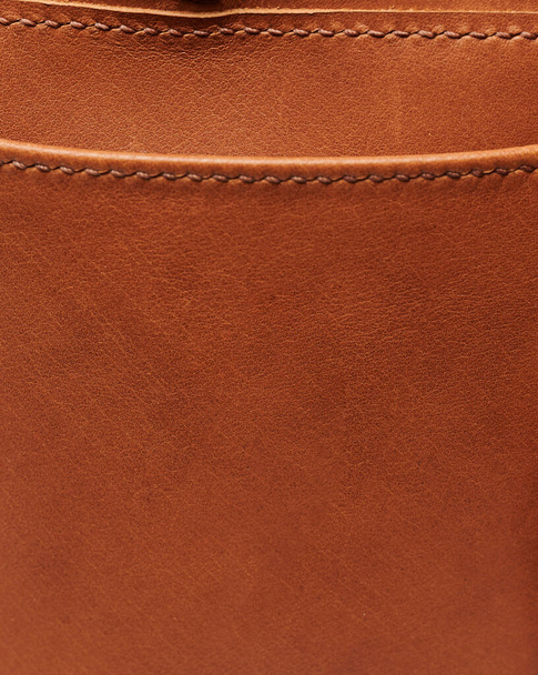 Fondo de cuero marrón con puntadas macro vista de cerca - Foto, Imagen
