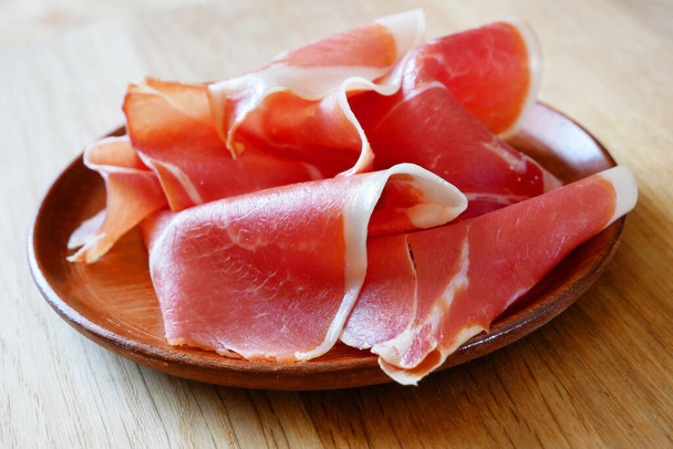 Slices Of Jamon On The Wooden Background, closeup - Photo, Image