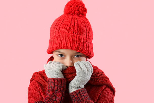 Cute little African-American boy in winter clothes on color background - Fotoğraf, Görsel