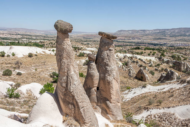 A Beautiful view of the valley of love in Cappadocia with mountain peaks in the summer day - Foto, immagini