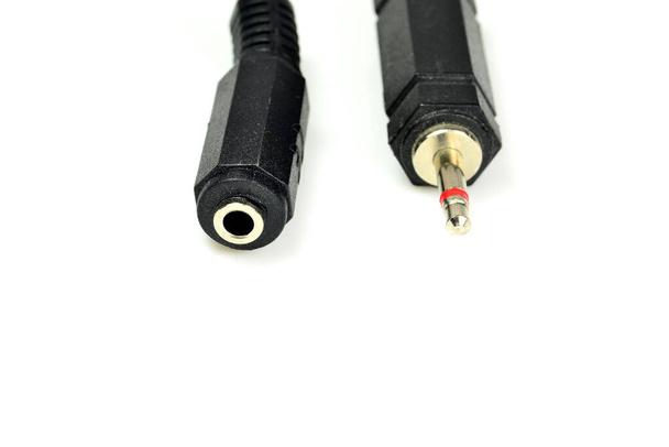 3,5 mm-es telefon csatlakozó közelről, csatlakozó egy hosszabbító kábel - Fotó, kép