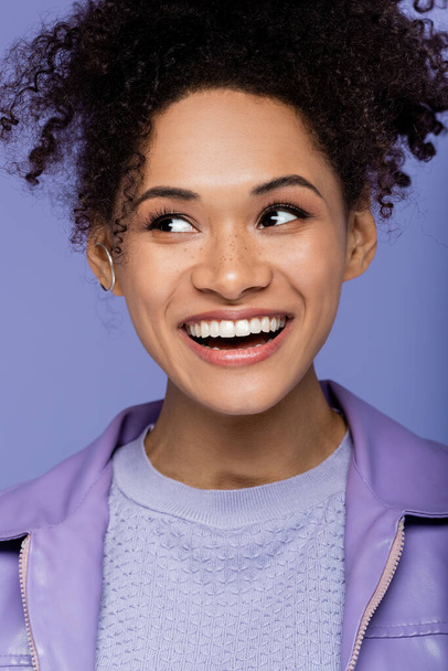 joyful african american woman isolated on purple  - 写真・画像