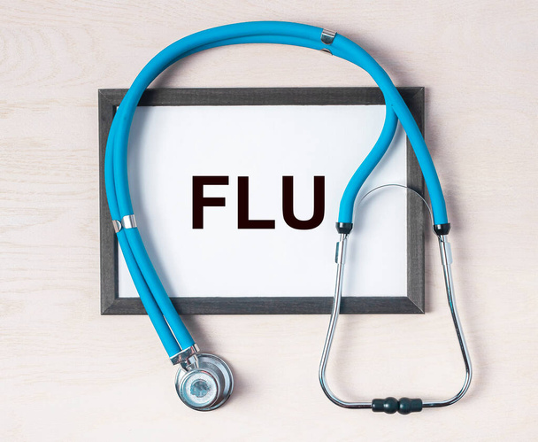 Flu word. Medical concept, influenza text on paper - Foto, Bild