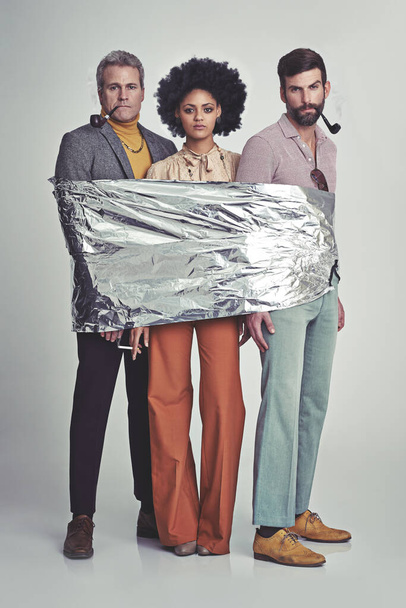 All wrapped and ready to bake. Three hippies wrapped in tin foil. - Foto, immagini