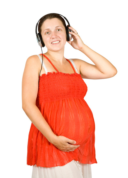 Pregnant woman listening to music - Zdjęcie, obraz