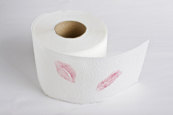 lippenstift merken op toiletpapier roll - Foto, afbeelding