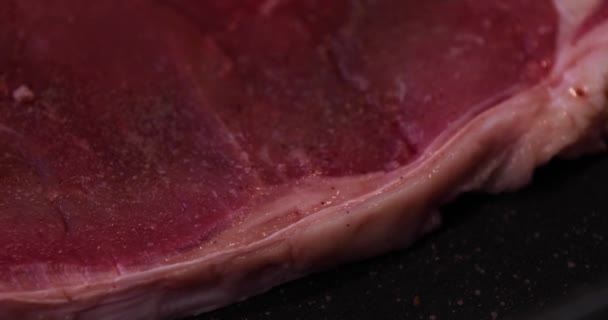 A timelapse of grilling T born stake meat on the pan in the kitchen close up - Footage, Video