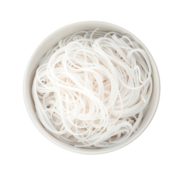 Bowl with cooked rice noodles isolated on white, top view - Zdjęcie, obraz