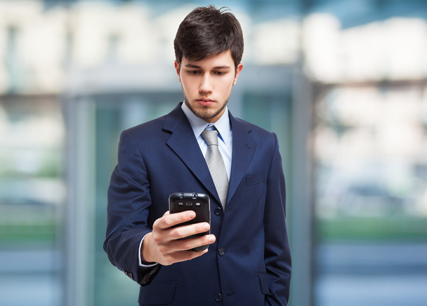 Businessman using mobile phone - Foto, Imagen