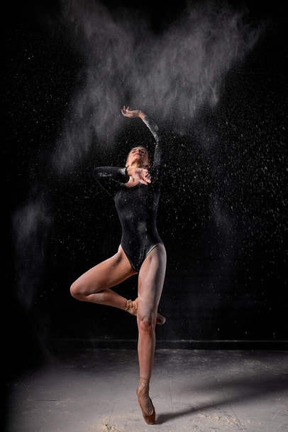 beautiful slender ballet dancer woman wearing bodysuit, posing dancing - Photo, Image