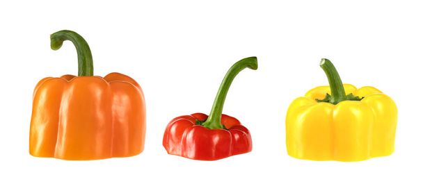red, yellow and orange peppers isolated on the white background - Photo, Image
