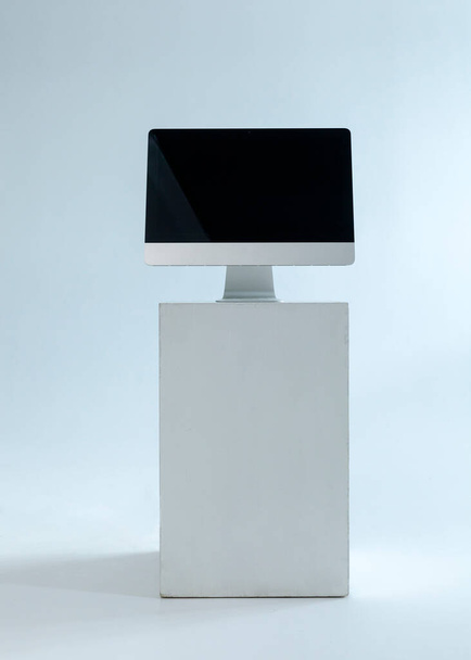 computer on a pedestal on a light background - Фото, зображення