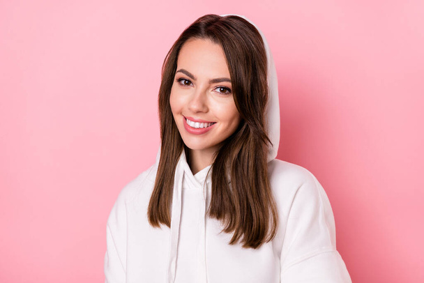 Photo of charming happy cheerful young woman wear hood sportswear sweater isolated on pink color background - Fotografie, Obrázek