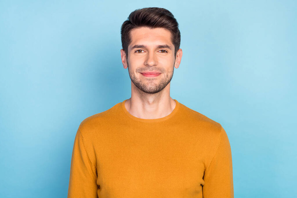 Photo of young handsome business man happy positive smile wear casual jumper isolated over blue color background - Fotó, kép