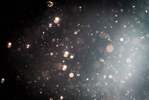 A fekete háttér absztrakt csillogó bokeh - Fotó, kép