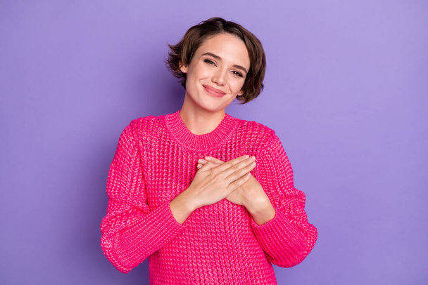 Photo of young girl happy positive smile hands on chest pleased thankful satisfied isolated over purple color background - Foto, immagini