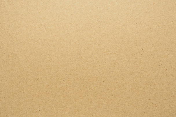 Fondo de cartón de textura de hoja de papel kraft reciclado ecológico marrón - Foto, Imagen