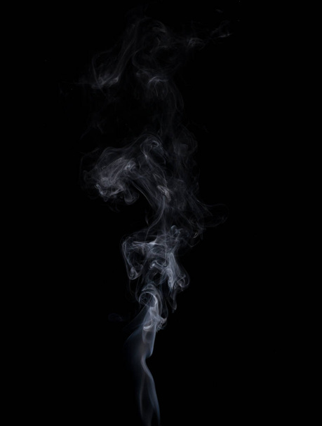 White smoke on black background. Abstract white smoke . - Foto, afbeelding