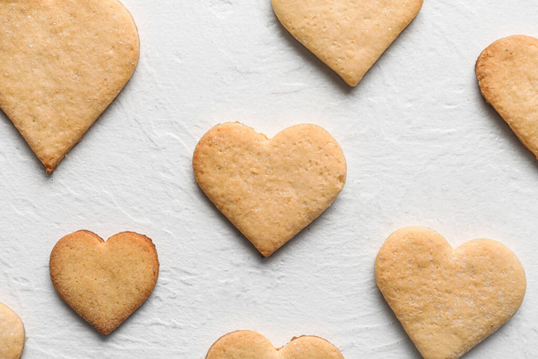Tasty heart shaped cookies on white background. Valentines Day celebration - Photo, image