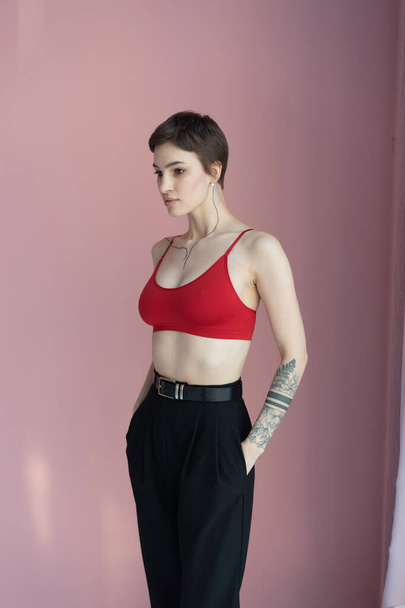 young beautiful woman pose in red lingerie in studio - Foto, immagini